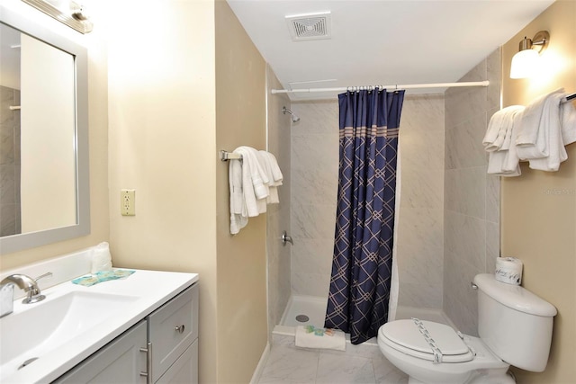 bathroom with vanity, toilet, and a shower with curtain