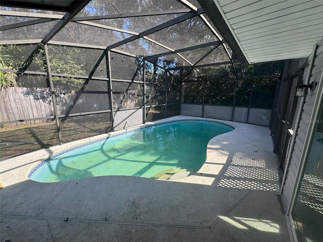 view of pool featuring a lanai and a patio area