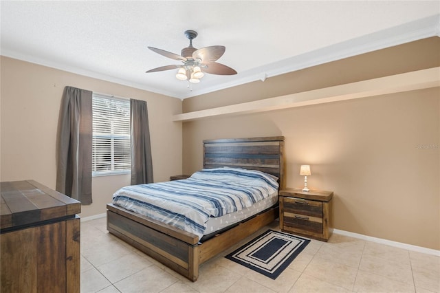 tiled bedroom featuring a textured ceiling, ornamental molding, and ceiling fan