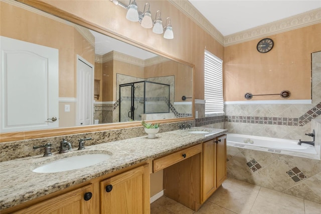 bathroom featuring plus walk in shower, vanity, and tile patterned floors