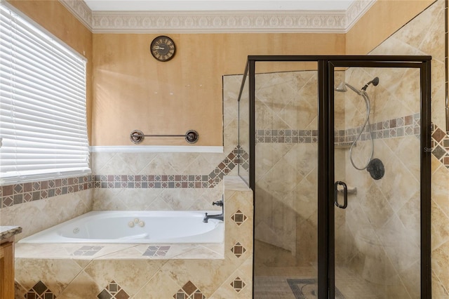 bathroom featuring separate shower and tub