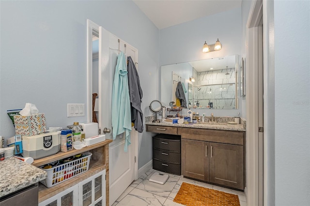 bathroom with vanity and walk in shower