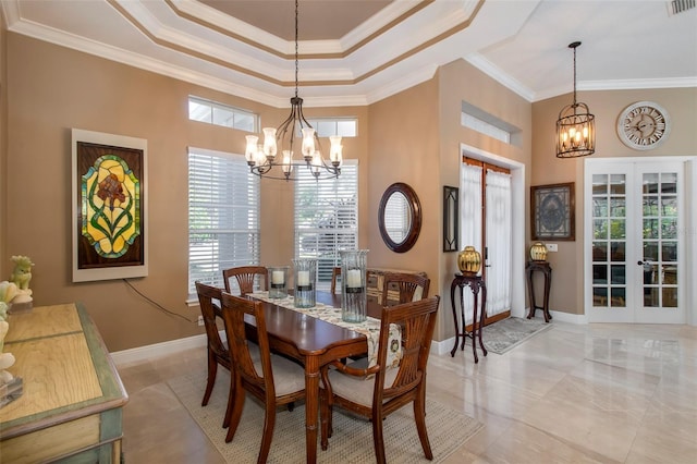 dining area with ornamental molding, a wealth of natural light, a notable chandelier, and french doors