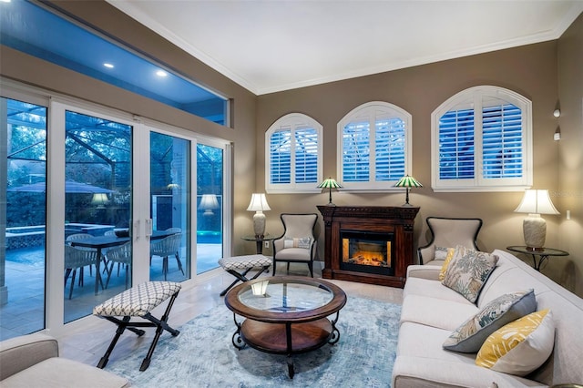 living room featuring crown molding