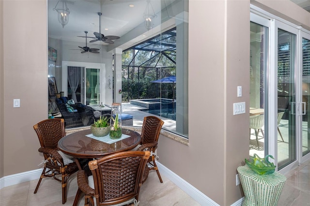 sunroom / solarium with ceiling fan