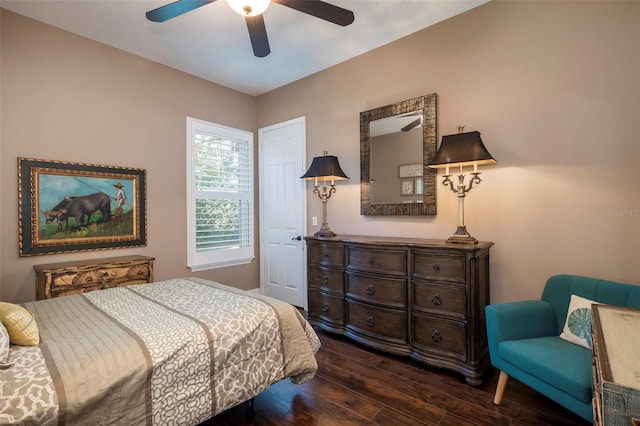 bedroom featuring ceiling fan and dark hardwood / wood-style flooring