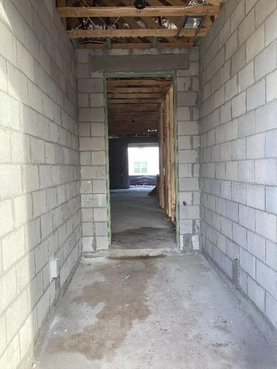 interior space with concrete flooring