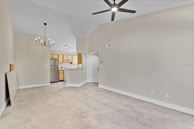 unfurnished living room featuring ceiling fan with notable chandelier and high vaulted ceiling