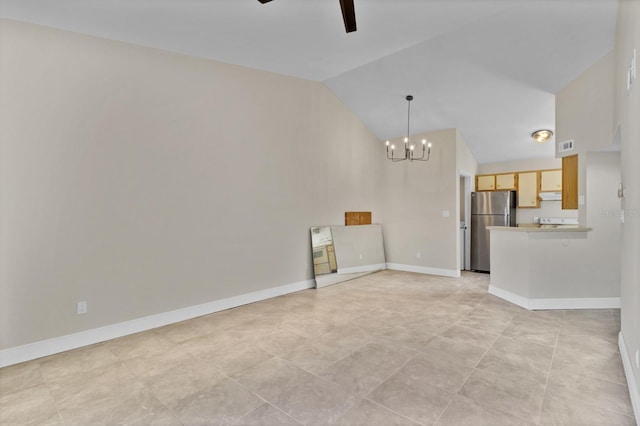 unfurnished living room with lofted ceiling and ceiling fan with notable chandelier