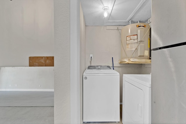 washroom featuring washing machine and clothes dryer