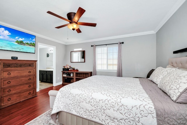 bedroom featuring hardwood / wood-style flooring, ensuite bath, ornamental molding, and ceiling fan