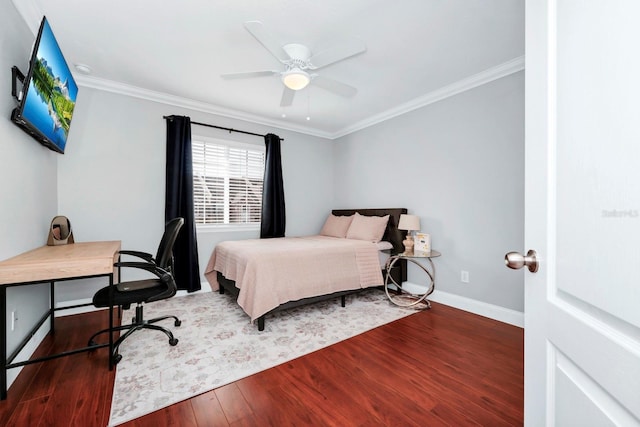 bedroom with dark hardwood / wood-style flooring, crown molding, and ceiling fan