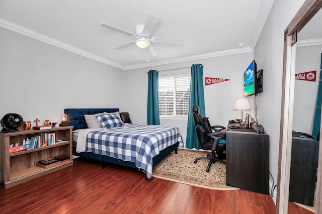 bedroom featuring crown molding, ceiling fan, and dark hardwood / wood-style floors