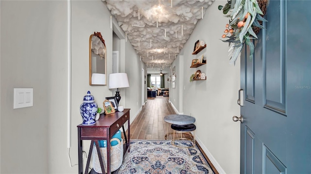 foyer entrance with wood-type flooring