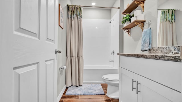 full bathroom featuring vanity, shower / bathtub combination with curtain, and toilet