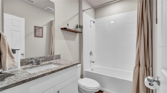 full bathroom featuring vanity, shower / bathtub combination with curtain, and toilet