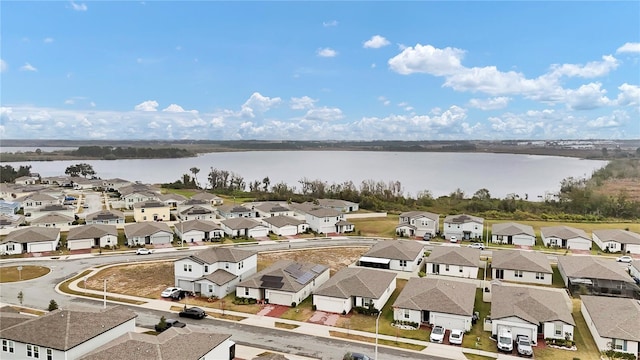 drone / aerial view featuring a water view