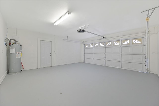 garage featuring a garage door opener and water heater