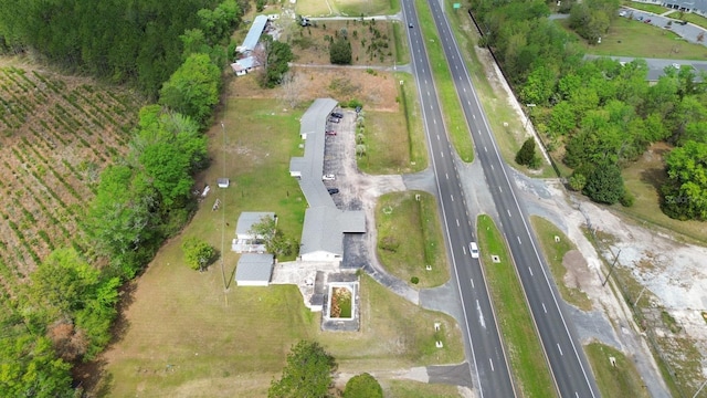 birds eye view of property featuring a rural view