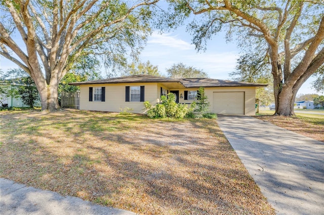 single story home featuring a garage