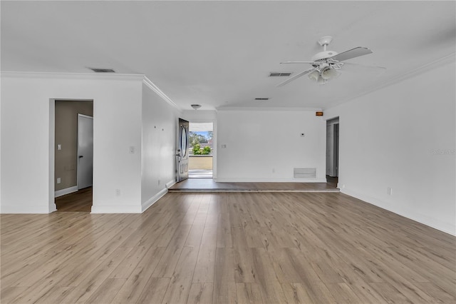 spare room with crown molding, light hardwood / wood-style flooring, and ceiling fan