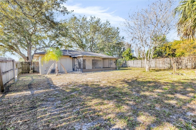 view of yard with a sunroom