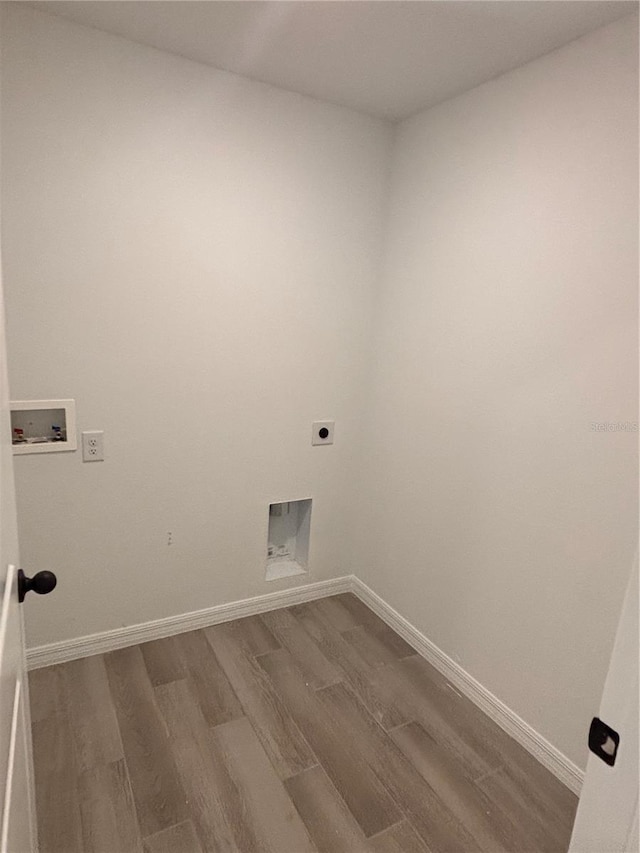 laundry area with washer hookup, wood-type flooring, and hookup for an electric dryer