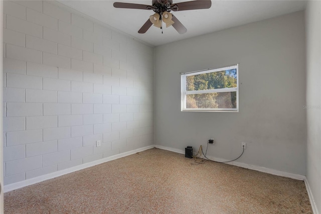 unfurnished room with ceiling fan