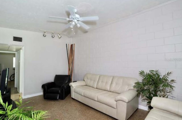 living room with track lighting and ceiling fan