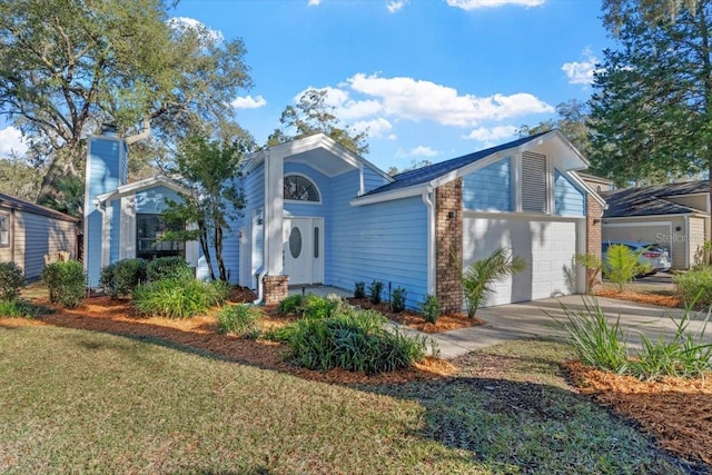 view of front of property with a garage