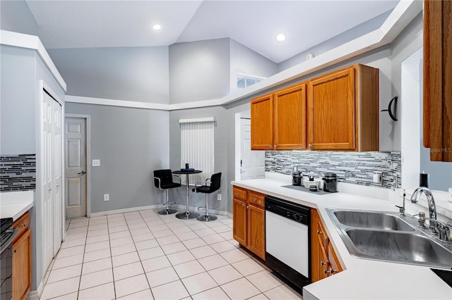 kitchen with light tile patterned flooring, high vaulted ceiling, dishwasher, sink, and decorative backsplash