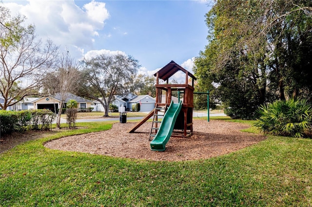 view of playground with a yard