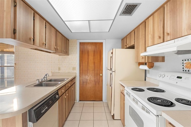 kitchen with sink, light tile patterned floors, dishwasher, and white range with electric stovetop