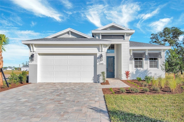 view of front of home with a garage