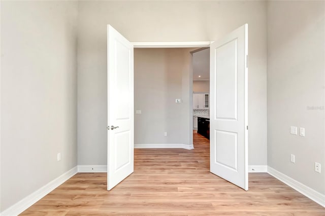 unfurnished bedroom with light hardwood / wood-style flooring