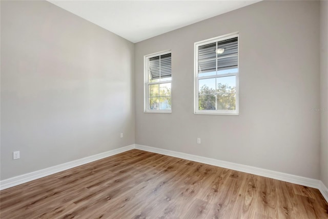 empty room with light wood-type flooring