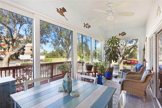 sunroom / solarium with ceiling fan