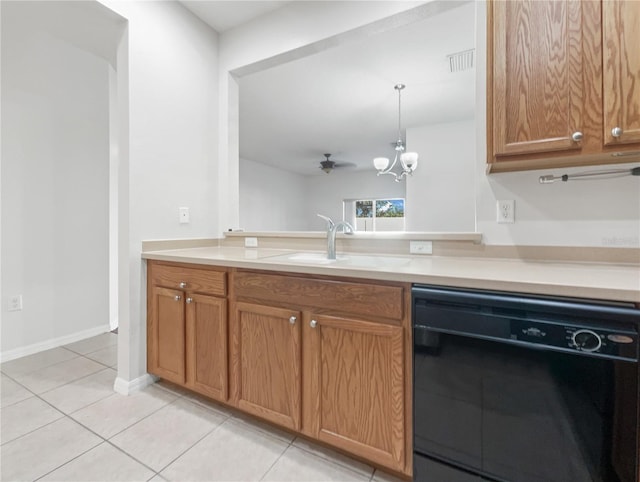 kitchen with sink, dishwasher, hanging light fixtures, light tile patterned flooring, and ceiling fan with notable chandelier