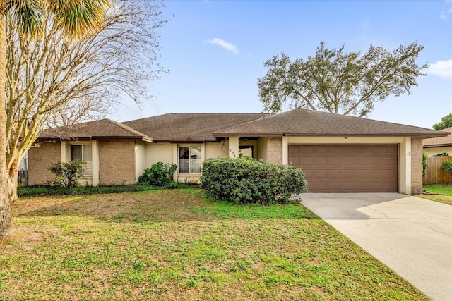 ranch-style house with a garage and a front yard