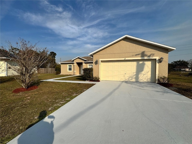 ranch-style home featuring a garage and a front lawn