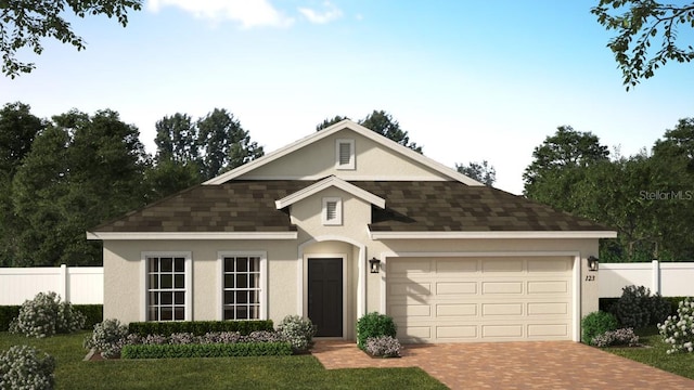 view of front facade featuring a garage and a front yard