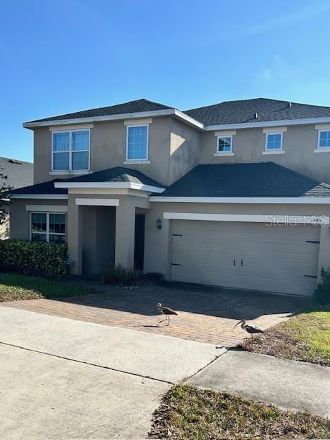 front facade with a garage