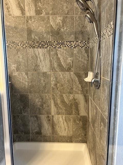 bathroom featuring walk in shower