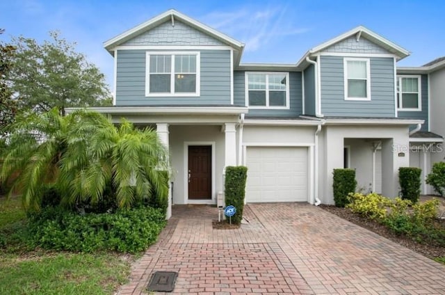 view of front of property with a garage