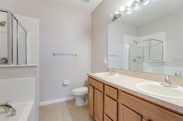 full bathroom with tile patterned floors, vanity, toilet, and independent shower and bath