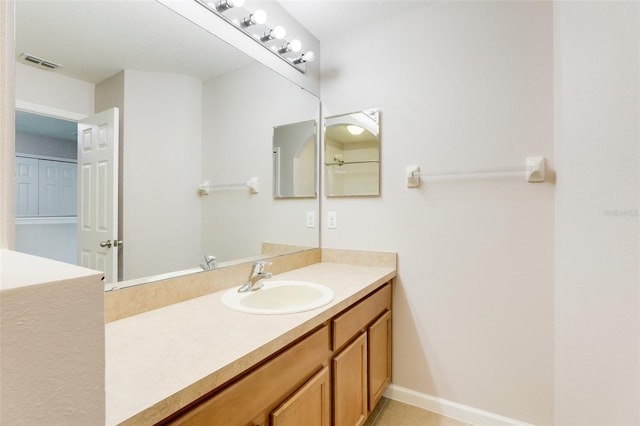 bathroom featuring vanity and tile patterned floors