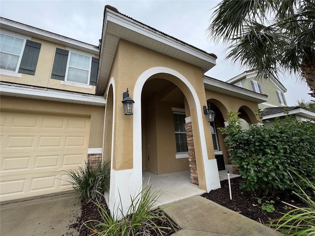 property entrance with a garage