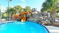 view of swimming pool featuring a water slide