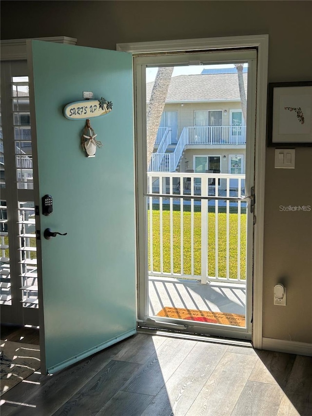 entryway featuring dark wood-type flooring