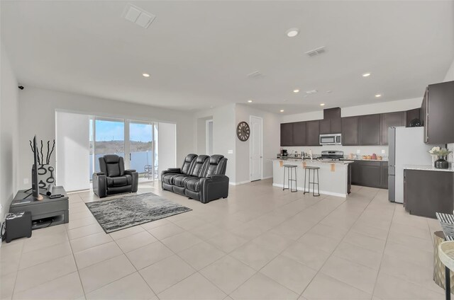 283 Archer Way, Haines City, FL 33844 - living room with light tile patterned flooring